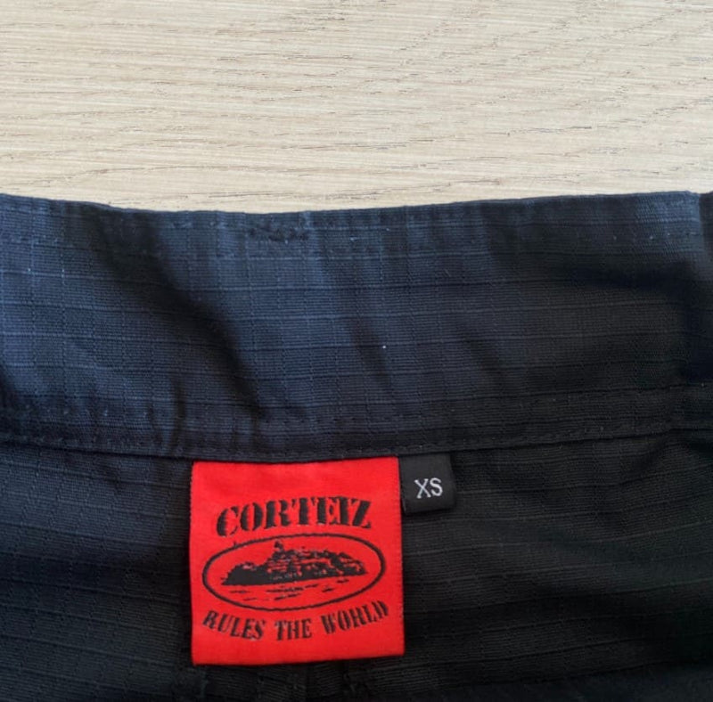 Calça Corteiz Guerillaz Cargo Black/Red