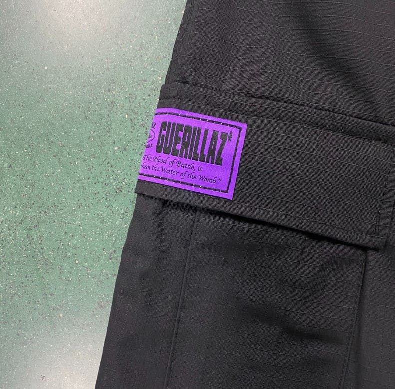 Calça Corteiz Guerillaz Cargo Black/Purple